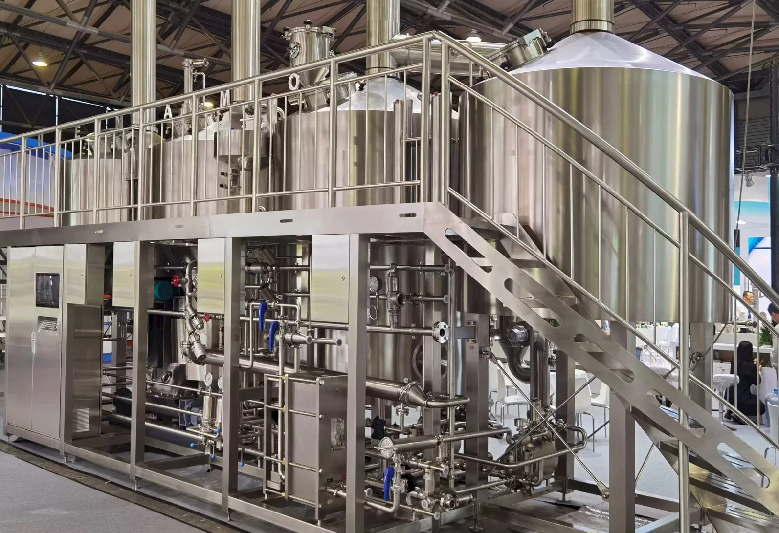 Stainless steel brewhouse with access platform and control panel